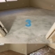 Room with different flooring stages and numbers.