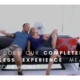 Couple relaxing on a modern sofa, smiling.